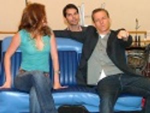 Erica and Christian take a ride (with J. Robert in the backseat) Photo