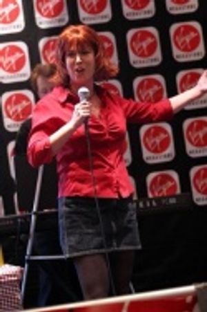 Valerie Fagan singing "Severed Head Lives Six Days" from "Expiring Minds"  Photo