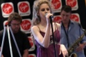 Brooke Sunny Morriber singing "The Tiger and the Target"
from "The Unknown"  Photo