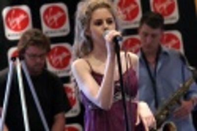 Brooke Sunny Morriber singing "The Tiger and the Target"
from "The Unknown"  Photo