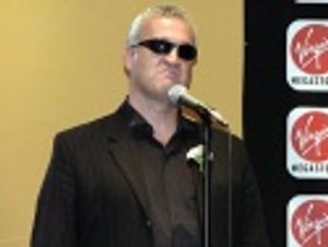 Robert DuSold as Don Imbroglio singing the aria
"Look How They Massacred My Cat" Photo