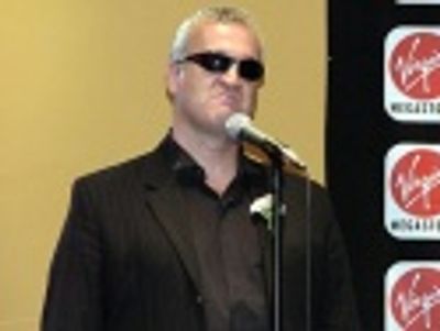 Robert DuSold as Don Imbroglio singing the aria
"Look How They Massacred My Cat" Photo