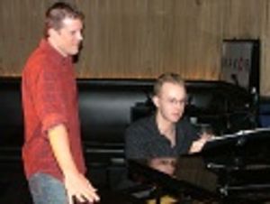 Manley Pope and musical director, Matt Richardson go over some
last minute details Photo