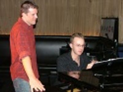 Manley Pope and musical director, Matt Richardson go over some
last minute details Photo