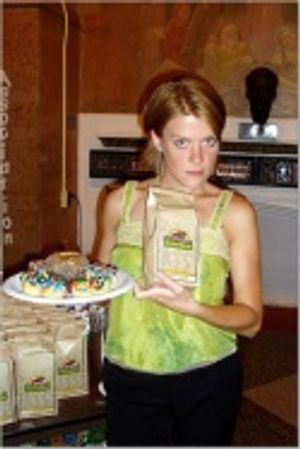 Producer Suzy Myers shows off the Crumbs Bakery Cupcakes and
Dale & Thomas Popcorn g Photo