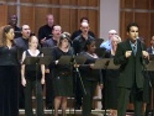 backed by a powerful chorus Photo