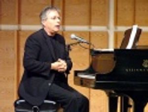 Alan concluded the evening with a medley of songs from his career Photo