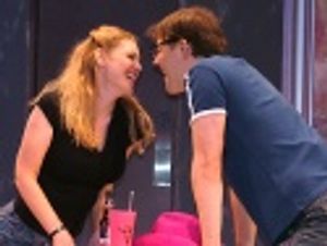 Heather Ayers and John Bolton start things off with
some country western style love Photo