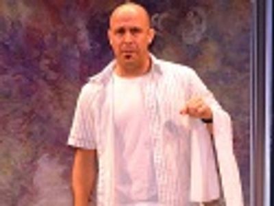 Jeff  Gurner plays the waiter for each story Photo