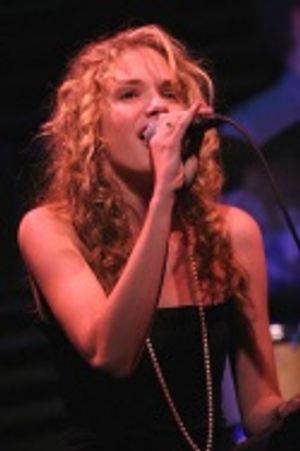 Mackenzie Mauzy - 'Another Suitcase in Another Hall' Photo