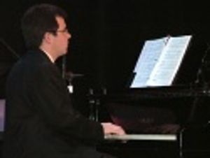 with Brian Lowdermilk at the piano Photo