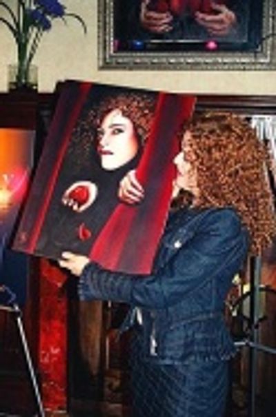 Bernadette shares the painting with the crowd  Photo