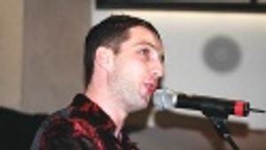 Euan Morton sings "Pretty Lies"  Photo