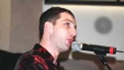 Euan Morton sings "Pretty Lies"  Photo