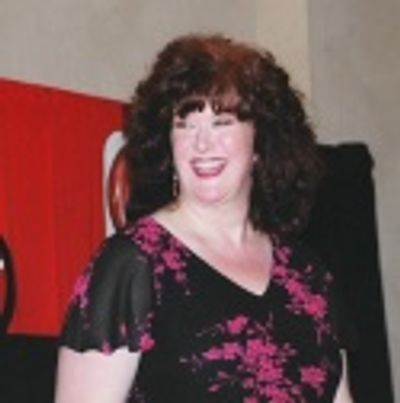 Liz smiling after her performance Photo