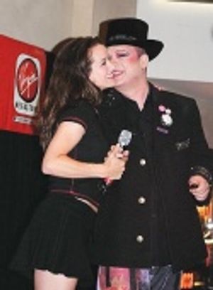 
Sarah and George after her performance

 Photo