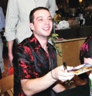 Euan signing for fans... Photo