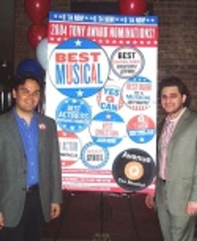 Posed in front of a blow-up of their NY Times ad - 6 nominations!
 Photo