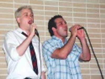 Michael Arden (sportin a new look!) and Aaron Lohr,
singing "Are You There?"  Photo
