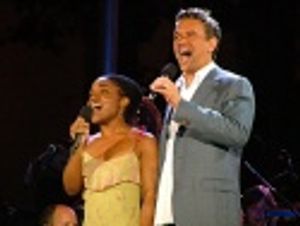 and is joined by Kenita Miller Photo