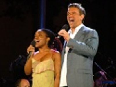 and is joined by Kenita Miller Photo