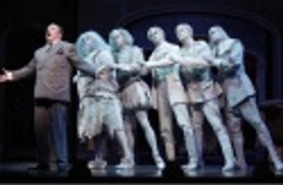 Nathan Lane with the male ensemble of The Addams Family Photo