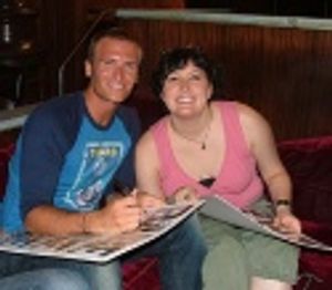 John Hill and Natalie Joy Johnson signing Bare posters Photo