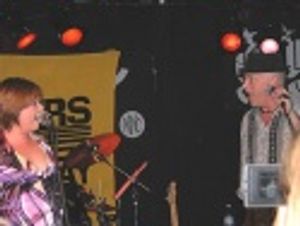 Donnie joined Kathy on stage at the end of the song... Photo