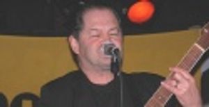 ...singing the Monkees hit Last Train to Clarksville  Photo