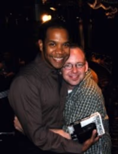 
Jamie and Darius deHaas take a moment to hug right before Billy Porter's big show.  Photo
