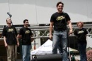 Troy Britton Johnson (forefront) and cast members of The Drowsy Chaperone
 Photo