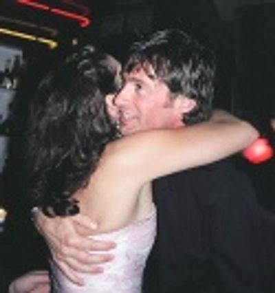 Hugh congratulates Stephanie on her triumphant evening Photo