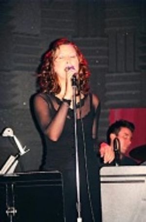 Kaitlin Hopkins singing "Brother Can You Spare Me a Dime" Photo