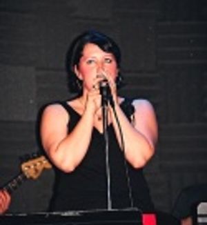 Natalie singing "Walk Away" Photo