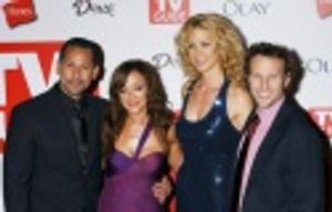 Leah Remini and Jenna Elfman with their husbands Photo