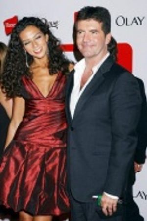 Simon Cowell and guest Photo