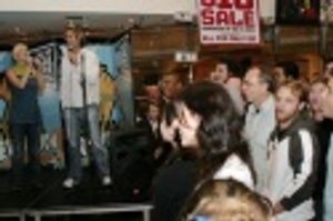 Hanna Liina-Vosa and Daniel Thornton singing "One True Friend" from Angels joined by  Photo