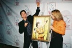Donny Osmond with his portrait for the Broadway Wall of Fame and Valerie Smaldone (Ho Photo