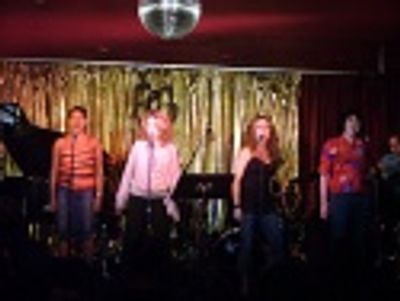 For the opening number "W-O-M-A-N", Lori was joined on stage
by Schele Williams, All Photo