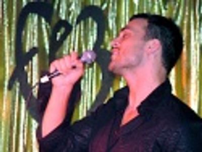 And then is joined by Cheyenne Jackson Photo