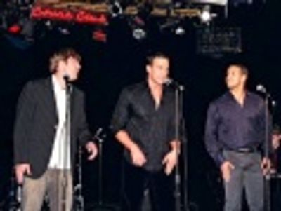 Bob Gaynor, Cheyenne Jackson and Jody Gaynor perforn the
opening song "New York, New Photo