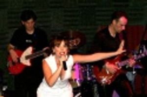 Leslie Kritzer and band members Photo