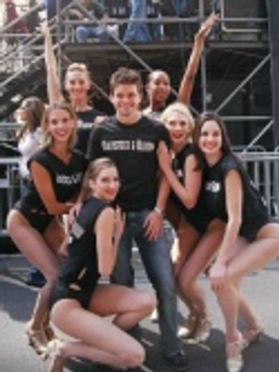 Hunter Foster right at home with the ladies
of The Producers Photo