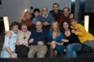 Neil Simon and his wife Elaine Joyce Simon with the cast of Lost in Yonkers Photo