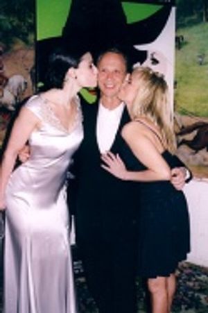 A Wizard, two Witches and a kiss...Oh My!
Menzel and Chenoweth plant one on Grey.
 Photo