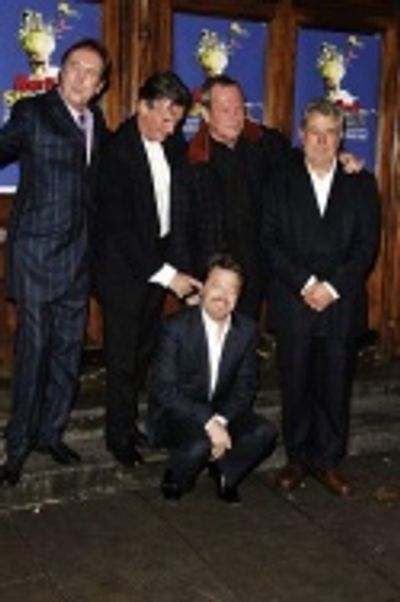 Monty Python's Eric Idle, Michael Palin, Terry Gilliam and Terry Jones with comedian  Photo