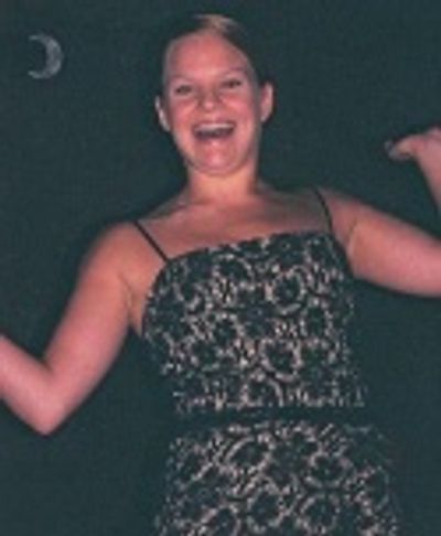 Leslie Goddard singing "I Think I May Want to Remember"  Photo