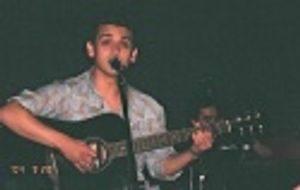 
Michael Longoria, strutting his stuff as singer-songwriter  Photo