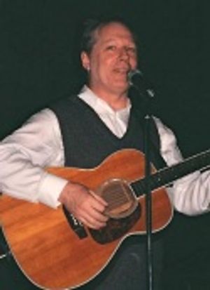 ...singing two of his own songs to much applause...  Photo