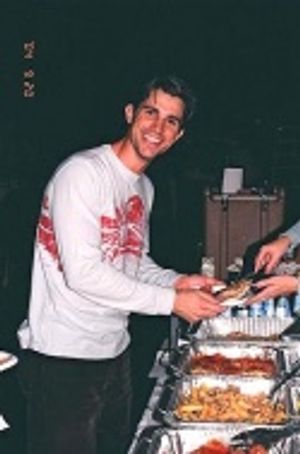 Matt Cavanaugh takes a moment to enjoy the scrumptious Italian cuisine graciously pro Photo